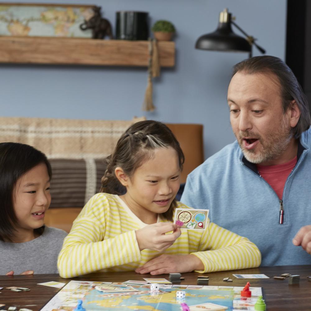 Monopoly Travel World Tour Board Game for Families and Kids Ages 8+, Includes Token Stampers and Dry-Erase Gameboard product thumbnail 1